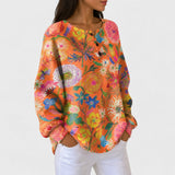 Florence | Orange Jumper with Colourful Floral Pattern