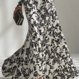 Nikita | Black & White Floral High-Neck Maxi Dress
